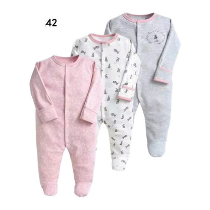 Drie nieuwe baby rompertjes met lange mouwen en voetjes