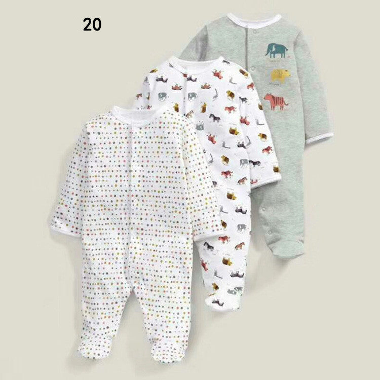 Drie nieuwe baby rompertjes met lange mouwen en voetjes