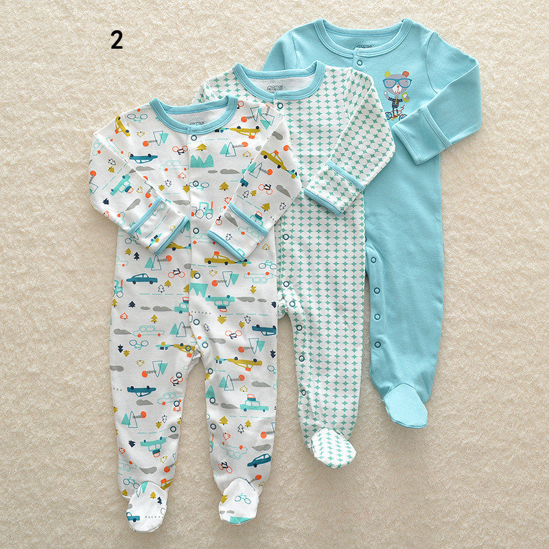 Drie nieuwe baby rompertjes met lange mouwen en voetjes