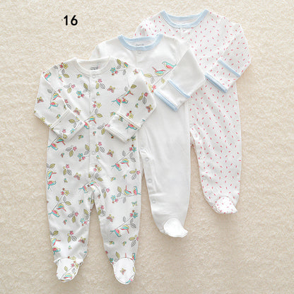 Drie nieuwe baby rompertjes met lange mouwen en voetjes