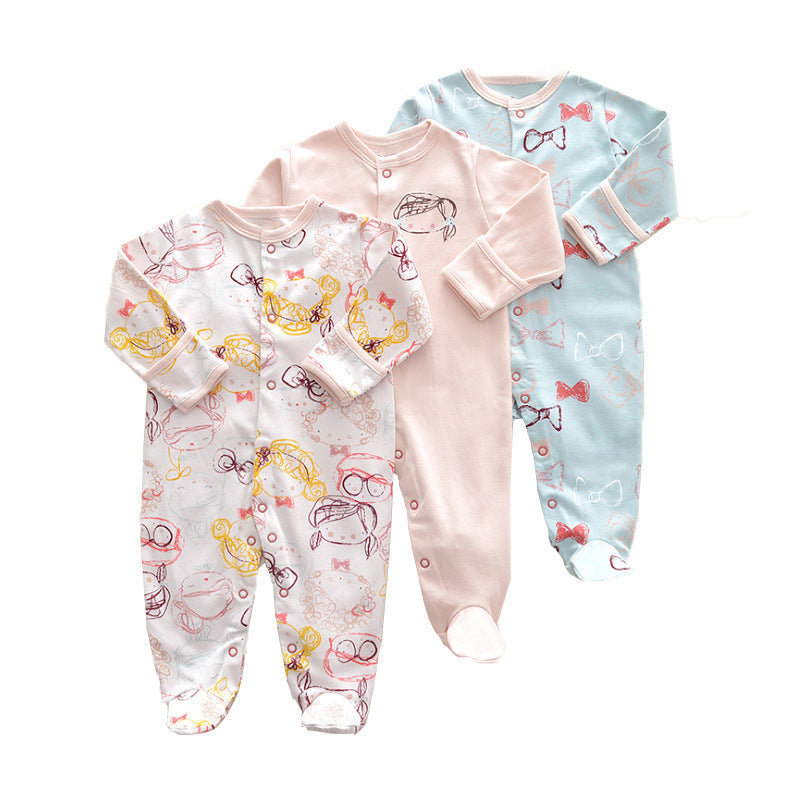 Drie nieuwe baby rompertjes met lange mouwen en voetjes