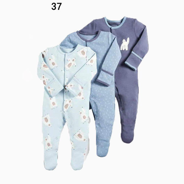 Drie nieuwe baby rompertjes met lange mouwen en voetjes