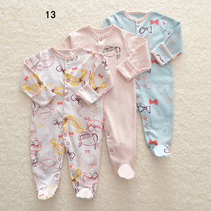 Drie nieuwe baby rompertjes met lange mouwen en voetjes