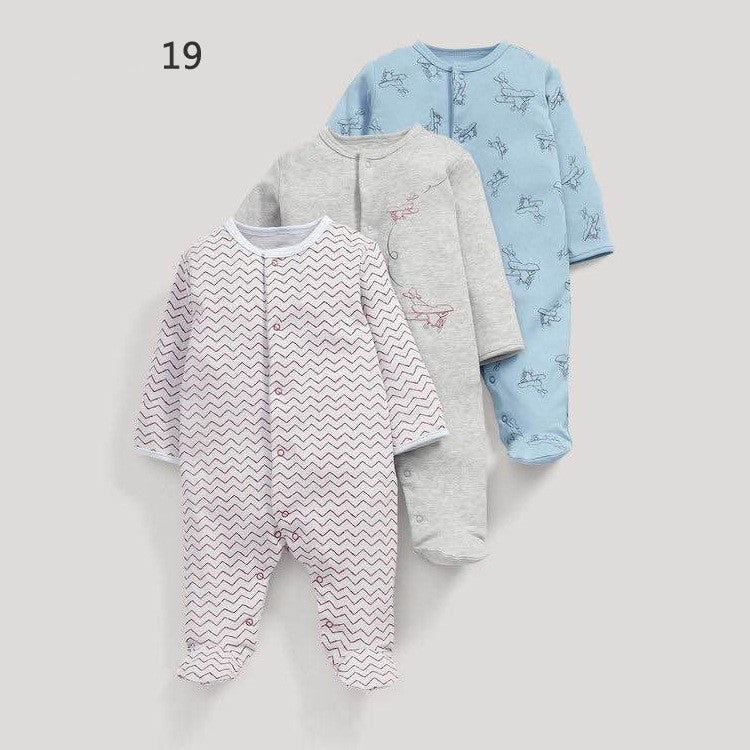 Drie nieuwe baby rompertjes met lange mouwen en voetjes