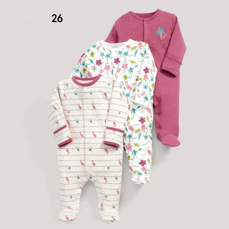 Drie nieuwe baby rompertjes met lange mouwen en voetjes