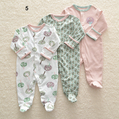 Drie nieuwe baby rompertjes met lange mouwen en voetjes